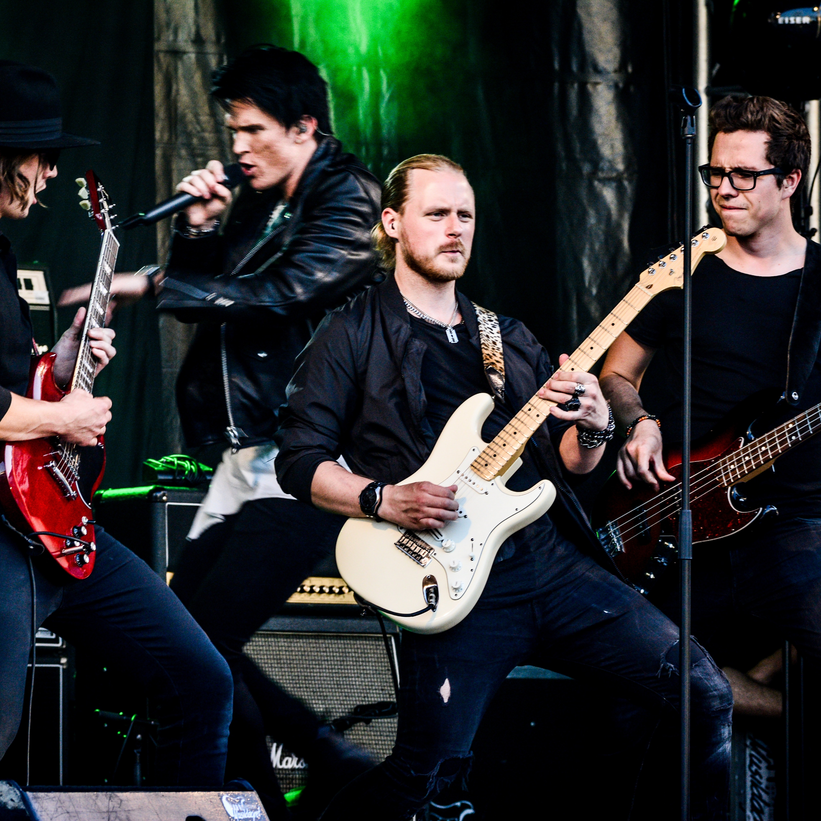 The four members of The Generics band posing together